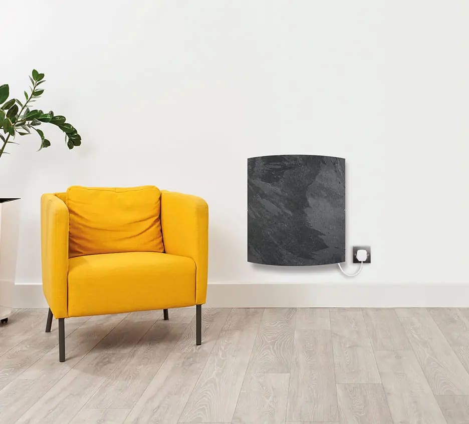 Curved Teide slate Climastar heater on a white wall